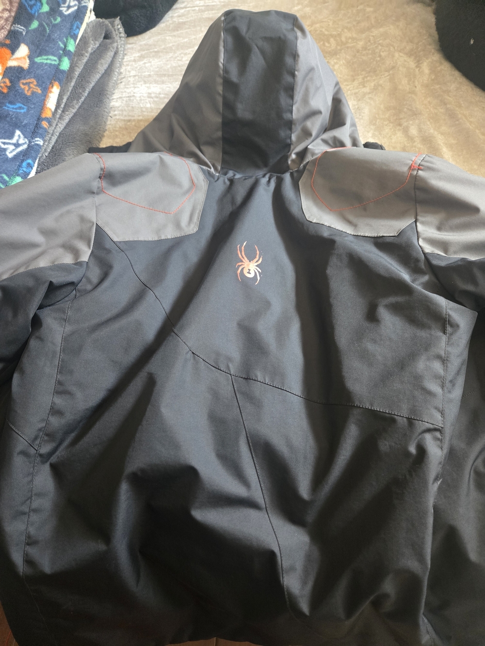 Size 18 Spyder Kids Black and Gray Hooded Raincoat with Red Logo Stitching